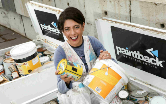 CEO Paintback holding paint buckets